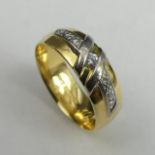 18ct gold diamond set ring, 8.9 grams. Size U, 12 mm wide. UK Postage £12.