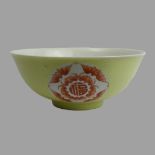 A Chinese yellow ground and iron red bat design bowl, character mark to underside. 19 x 8 cm. UK