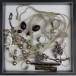 Silver necklaces, Art Deco style brooches, silver bracelet, ring and a pair of cherry amber