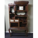 Late 19th century Oriental carved hardwood display cabinet. Collection only