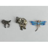 Sterling silver and enamel brooch, silver and marcasite foal brooch and a silver elephant brooch.