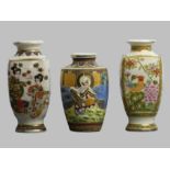Three Japanese Satsuma pottery vases, one decorated with figures of immortals in relief. 19.5 cm and