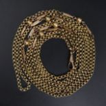 9 carat gold long guard chain, 28. 4 grams. 94 cm, beads 5.7 mm. UK Postage £12.