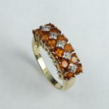 9 carat gold orange tourmaline and diamond ring, 3.7 grams. 7.1 mm wide, Size N 1/2. UK Postage £12.