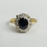 18 carat gold sapphire and diamond ring, 4.2 grams. Size R, 12.7 mm wide. UK Postage £12.