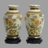 A pair of Japanese Satsuma pottery vases and stands, circa 1920. 18.5 cm. UK Postage £12.