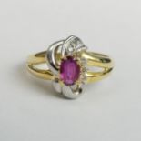 9 carat two colour gold ruby and diamond ring, 4.7 grams. Size P, 13.4 mm wide. UK Postage £12.