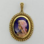 14 carat gold and enamel portrait pendant, 23.4 grams. 60 x 38 mm. UK postage £12.