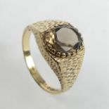 9 carat gold smokey quartz ring, 3.1 grams. Size O 1/2, 10.7 mm. UK Postage £12.