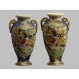 Early 20th century pair of Japanese Satsuma pottery vases. 22 cm. UK Postage £15.