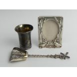 Silver vodka cup, silver widmill design caddy spoon and a silver scenes photo frame. UK postage £12.