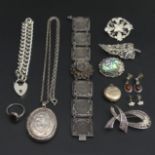 Various items of silver jewellery, including a locket pendant and chain, a filigree bracelet and a