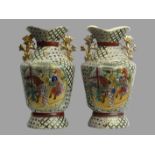 A large pair of Japanese Satsuma pottery vases. 29 cm. UK Postage £20.