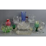 A collection of Victorian and later glassware including cut and coloured glass and a Waterford