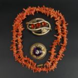 Victorian stone set brooch, mourning brooch and a coral twig necklace. Largest brooch 60 mm wide,