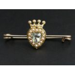 Edwardian 9 carat and 15 carat (tested) seed pearl and pale green stone coronet design brooch, 2.5