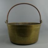 A large and heavy old brass and steel jam pan. 40 x 23.5 cm exc. the handle. UK Postage £25.