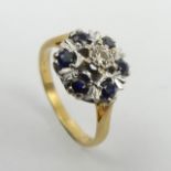 18ct gold sapphire and diamond cluster ring, 3.6 grams. Size M, 11 mm. UK Postage £12.