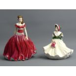 Two Royal Doulton figurines - English Rose hn5029 and Christmas Day 2008. UK Postage £15.