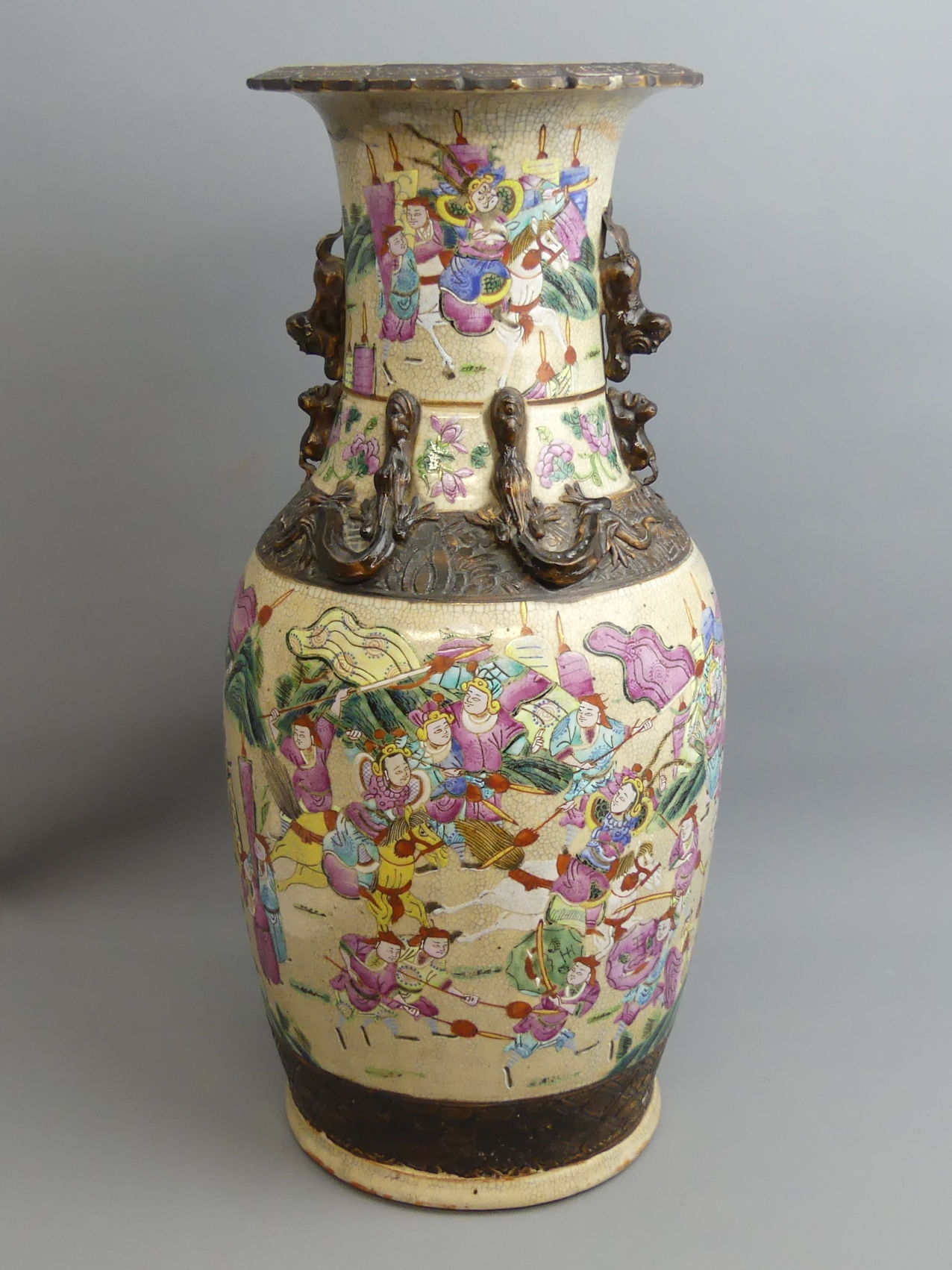 A late 19th century Chinese famille rose warrior scene crackle glaze vase. 45.5 cm. UK Postage £30.