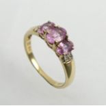 9ct gold pink topaz and diamond ring, 1.9 grams. Size M 1/2, 5.8 grams. UK Postage £12.