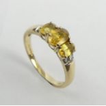 9ct gold citrine and diamond ring, 1.9 grams. Size M, 5.8 grams. UK Postage £12.