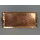 John Pearson Arts and Crafts hand beaten copper twin handled tray. JP stamps. 52 x 23 cm. UK Postage