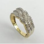 9ct gold diamond wave design ring, 2.7 grams. Size J, 7.4 mm. UK Postage £12.