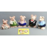 Five Wade NatWest pig money banks along with a related birthday card. UK Postage £18.