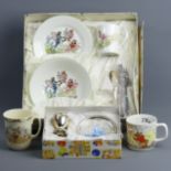 A Flower Fairies boxed china set, a Rupert mug, a Bunnykins mug and a silver plated christening set.