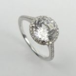 18ct white gold white topaz and diamond ring, 2.7 grams. Size M. UK Postage £12.