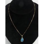 9ct gold opal doublet pendant and chain, 4.2 grams. 23 mm long. UK Postage £12.