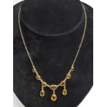 9ct gold citrine drop necklace, 9.3 grams. 41 cm long. UK Postage £12.