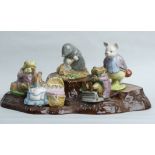 Beswick pottery stand with five Beatrix Potter character figures. UK Postage £15.