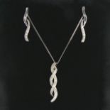 9ct white gold diamond pendant and chain with matching earrings, 3 grams. Pendant 25 mm. UK