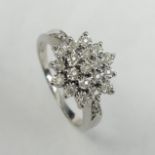 9 carat white gold diamond cluster ring, 3.8 grams. Size O, 12.6 mm wide. UK Postage £12.