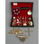 A box of crosses, medals, badges and an Albert chain among other items. UK Postage £15.