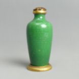 A Chinese green glazed gilt metal mounted snuff bottle. 8.2 cm. UK Postage £12.