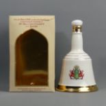 An un-opened bottle of Bells scotch whisky, issued by Wade to celebrate the 60th birthday of Queen