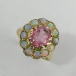 9ct gold opal and tourmaline ring, London 1960, 4.1 grams. Size N, 17 mm. UK Postage £12.