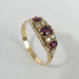 18ct gold ruby and diamond ring, 3.7 grams. Size P, 5.6 mm. UK Postage £12.