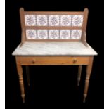 Victorian pine wash stand with a marble top and white splash back. 91 x 118 x 46 cm. Collection