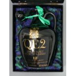 An unopened bottle of QEII single 12 year old malt whisky. 75 cl. UK Postage £15.