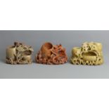 Three Chinese carved soapstone ornaments. Largest 12.5 x 18 cm. UK Postage £16.