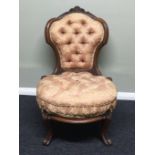 A Victorian upholstered walnut nursing chair. 77 x 50 cm. Collection only.