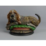 Cast iron doorstop in the form of a Basset hound, 34 x 22 cm. UK Postage £16.