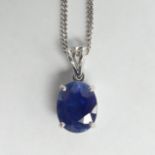 18ct white gold sapphire pendant and chain, 5.8 grams. Stone 8.2 x 11 mm, chain 45 cm. UK Postage £