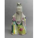 Chinese porcelain figure of Buddha in the famille rose palette, 20 cm. UK Postage £12.