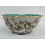 Chinese famille rose bowl with a turquoise glazed interior, the base with a seal mark. 12 x 5 cm. UK