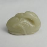 A Chinese celadon jade carving in the form of a swan, 42 x 30 mm. UK Postage £12.